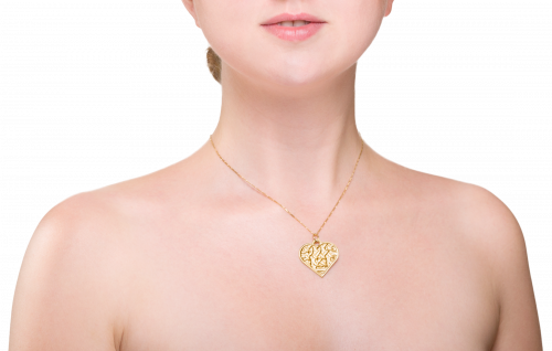 Celtic knot necklace made in yellow gold plated brass. Heart shaped. On gold chain.